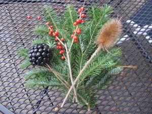 Fir, winterberry, carrion berry, teasel ready to tie on